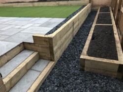 Synthetic turf, raised planters and new patio. IMG_2441